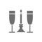 Two glasses with candle, romance grey icon.