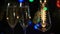 Two glasses champagne light bulbs festive atmosphere multicolored garland