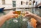 Two glasses click toasting cheers of couple celebrating holidays