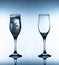 Two glasses on gradient white and blue background