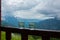 Two glasses of grappa on the wooden railing of the mountain hote terrace