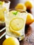 Two glasses of lemonade shot close up