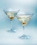 Two glasses martini with olive. cocktail isolated
