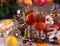 Two glasses with mulled wine on a tray with christmas accessories