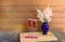 Two glasses of rose champagne, fresh raspberry and astilbe flowers on wooden table