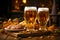 two glasses of steamed beer on a wooden table against the background of freshly baked rolls, bread, hops and malt