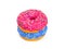 Two glazed doughnuts, blue and pink, on a white background