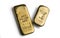 Two gold bars weighing 500 grams each isolated on a white background. Swiss and German gold bars.