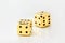 Two gold dice