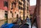 Two gondolas in a small medieval canal. Venice, Italy