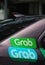Two Grab Stickers On Car`s Rear Panel