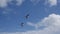 Two great frigatebird black birds largest seabird flying in blue cloudy sky