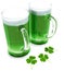 Two green beer\'s with clovers