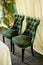 Two green chairs lined with green velvet.Gorgeous, palace style.