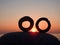 Two green glass rings found on Baltic sea coast in sunset colors, Lithuania