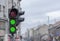 Two green semaphore light in city urban blury background