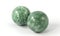 Two green stone balls