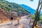 Two guys hiking in Morocco`s Rif Mountains under Chefchaouen city, Morocco