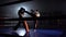 Two guys preparing for kickboxing competitions. Slow motion. Silhouette