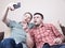 Two guys taking selfie