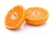 Two half tangerine on white background