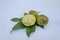 Two And A Half White Sapote Fruits And Leaves
