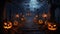 Two halloween pumpkins on fence with starry sky in the background vertical orientation