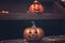 Two Halloween pumpkins on home porch. Seasonal House decoration