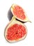 Two halves of fresh ripe figs isolated on a white background. Side view. Natural realistic color