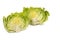 The two halves of iceberg lettuce bunch isolated on white background