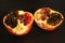 two halves of a pomegranate, rotten half