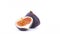 Two halves of ripe common fig fruit. Slowly rotating on the turntable isolated on the white background. Close-up.