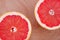 Two halves sliced of grapefruit