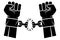 Two hands clenched into a fist tearing chains that they shackled the symbol of the revolution of freedom. Human hands and broken c