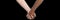 Two hands in a heartfelt embrace and a glow shining around them. Handshake. Two women holding hands. Two hands of