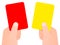 Two hands holding red and yellow card