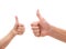 Two hands making thumbs up gesture