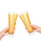 Two hands with pilsner glasses of beer for banners, flyers, posters, cards. Light beer with foam. International Beer Day