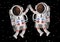 Two happy astronauts floating in space
