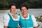 Two happy Bavarian ladies in dirndls