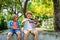 Two happy boys playing violin