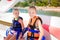 Two happy girls parasailing