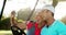 Two happy golfers taking a selfie in golf buggy