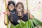 Two happy little girls dressed in african tribe costumes for mas