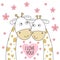 Two happy lovely giraffes on a flowers background.