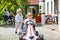 Two happy sibling boys playing with toy car