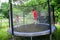 Two happy sisters on trampoline