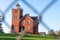 Two Harbors, Minnesota  lighthouse, framed by a fence