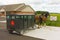 Two harnessed horses used to pull an amish wagon