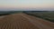 Two harvesters tresh wheat aerial view